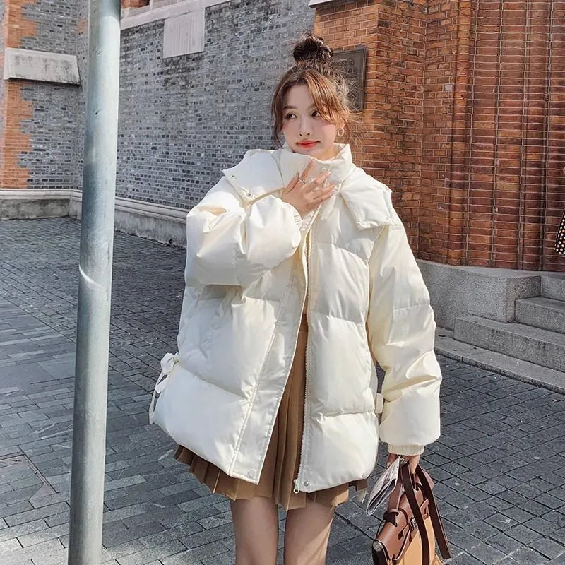 Women's loose insulated jacket with princess sleeves in milky white colour