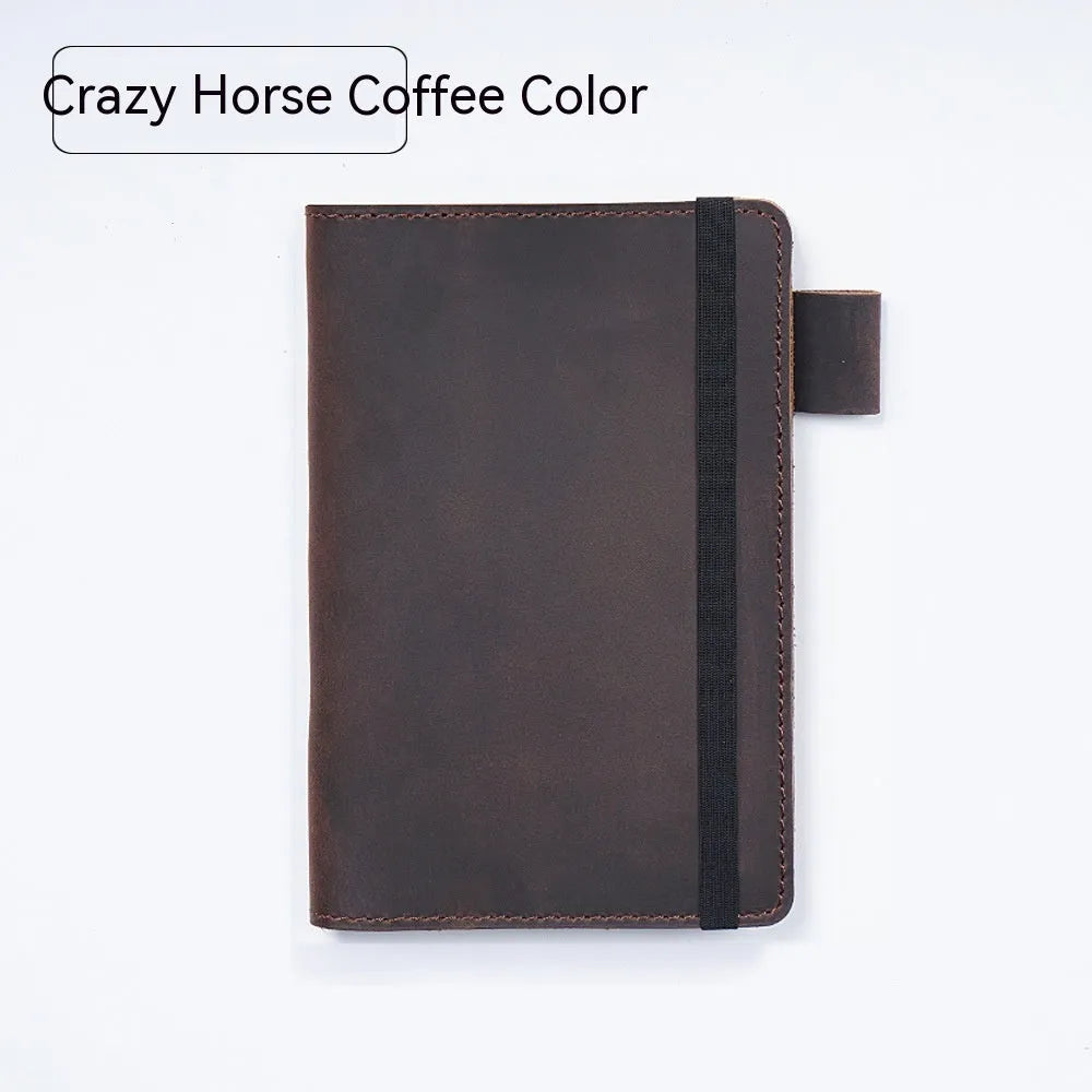 Handmade kraft notebook with cowhide cover in choice of six colours, showing open pages of wood-free paper.