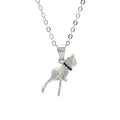 Close-up of a sterling silver cat pendant necklace on a clavicle, showing the electroplated finish.