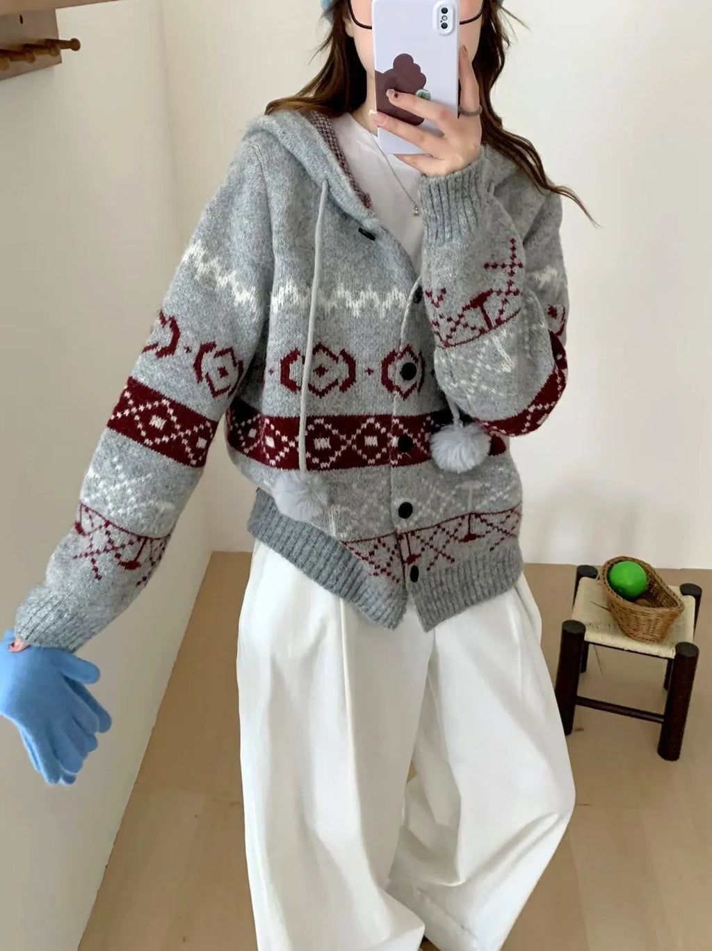 Plus size loose grey acrylic sweater coat with white geometric brocade pattern.