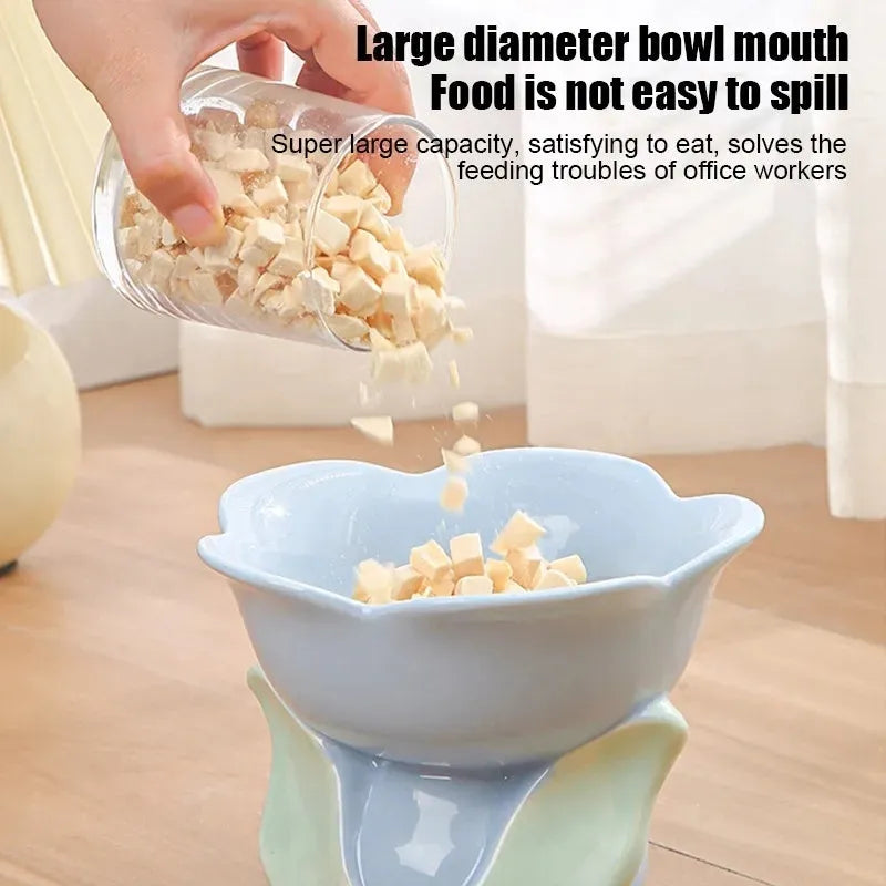 Blue floral patterned ceramic raised pet bowl with non-slip base for cats and small dogs
