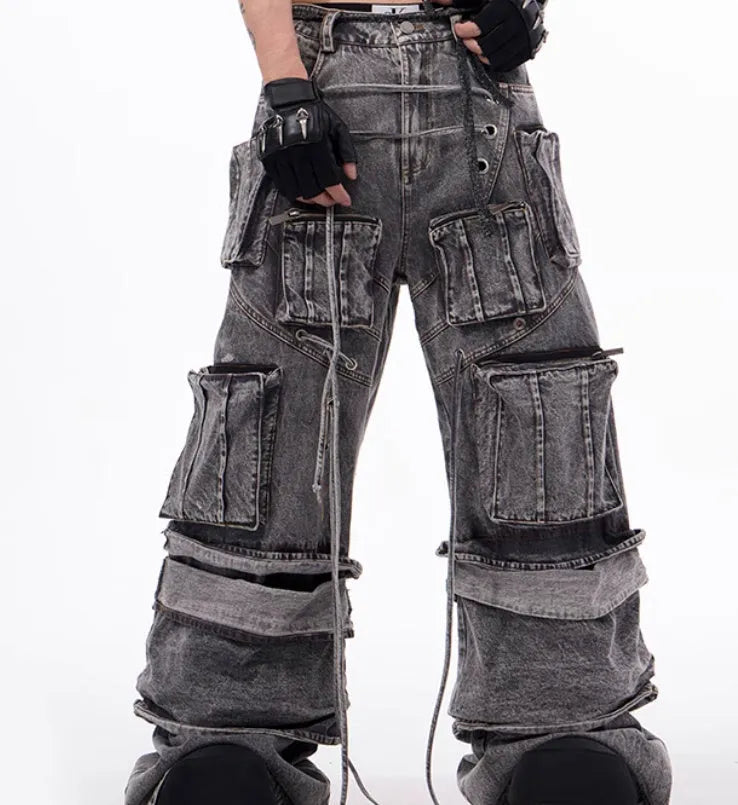 Grey distressed denim overalls with rope stitching and mop pant design
