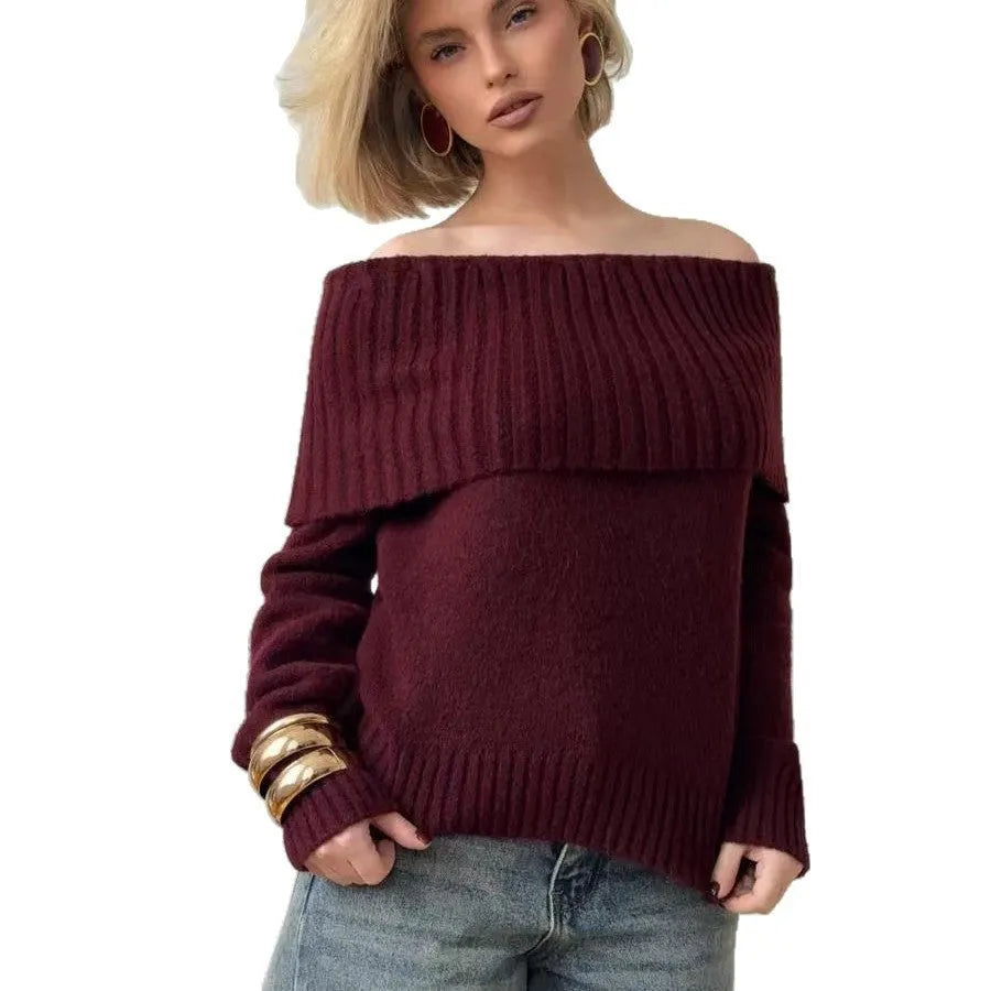 Woman wearing a grey off-the-shoulder sweater with a 3D textured pattern.