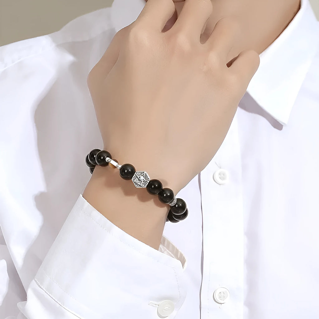 Men's geometric God's Eye obsidian bracelet in S925 sterling silver on wrist