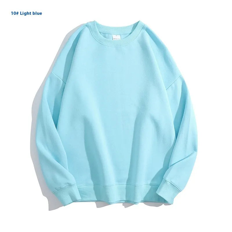Cotton loose fit off shoulder pullover sweater in a selection of colours on a hanger