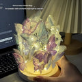 Butterfly night lamp with glass shade and wood base measuring 12x15cm