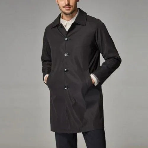 Man wearing khaki rabbit fur trench coat with loose fit and mid-length design