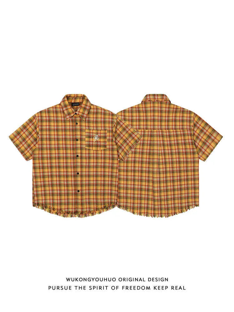 Yellow plaid short sleeve shirt with embroidery pocket detail in loose fit for men and women