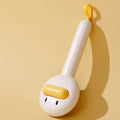 Small yellow duck comb brush for pet hair removal with open-section needle design