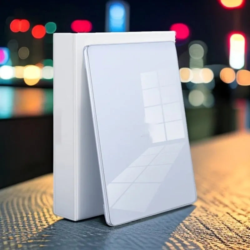 Clear transparent plastic protective shell case for a MacBook Air or Pro laptop on a table.