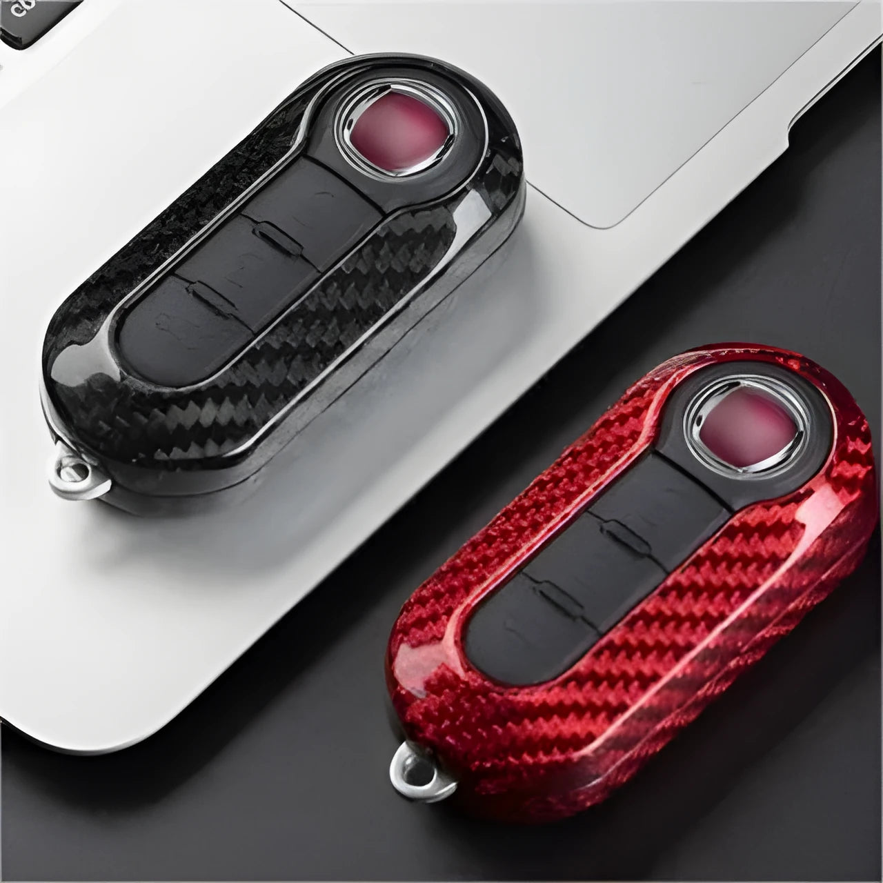 Xiaomi car key replacement shell in carbon fibre black, glass fibre red, and glass fibre silver-black finishes.