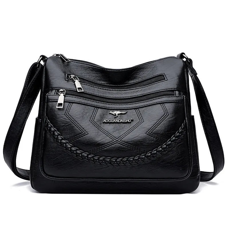 Soft leather shoulder bag in horizontal square shape with large capacity and internal zipper compartment