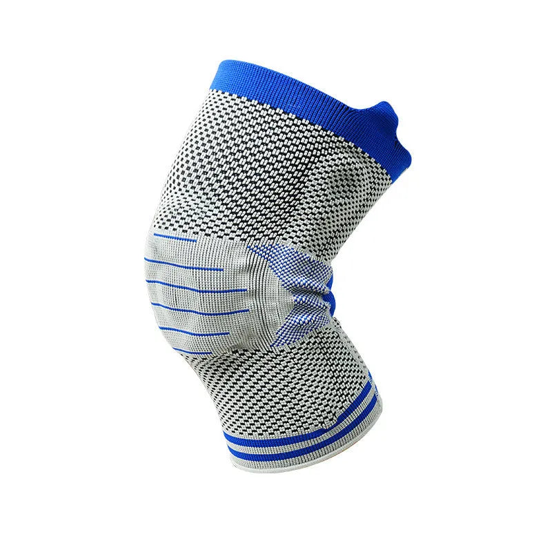 Black and gray knee pad with silicone shock absorber for sports protection on a leg.