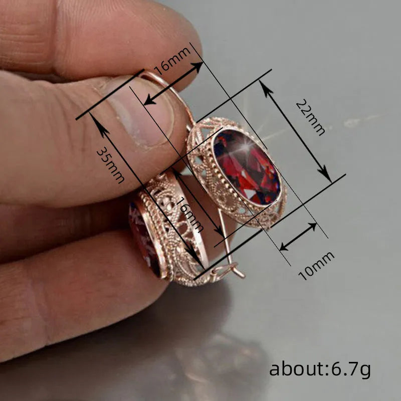 Women's copper and glass geometric earrings in red and blue with ellipse and ring shapes