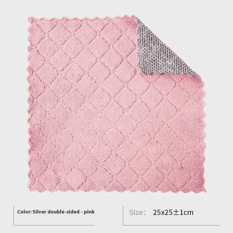 Silver wire and microfiber scouring pad cloth for cleaning pots and bowls on a kitchen counter.