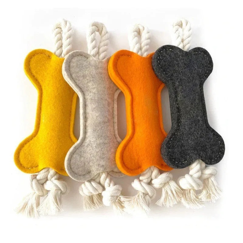 Bone shaped dog rope toy with felt exterior in four colour options