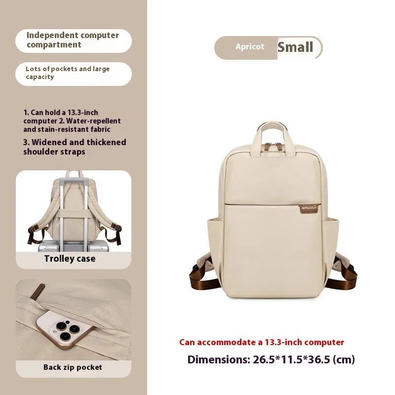 Large nylon women's travel backpack in apricot colour showing internal laptop compartment and multiple pockets.