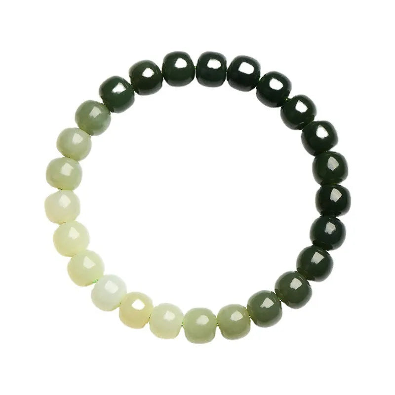 Polished Hetian Jade bracelet showing a gradient water colour on beads.
