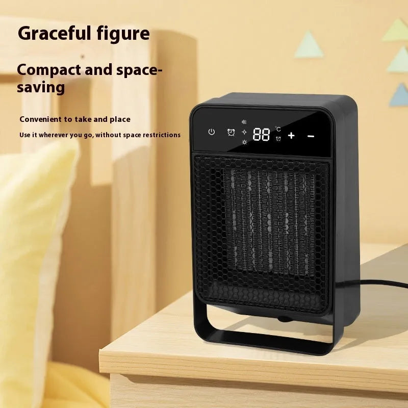Black desktop warm air blower heater with a digital touch screen display and remote control on a wooden desk.