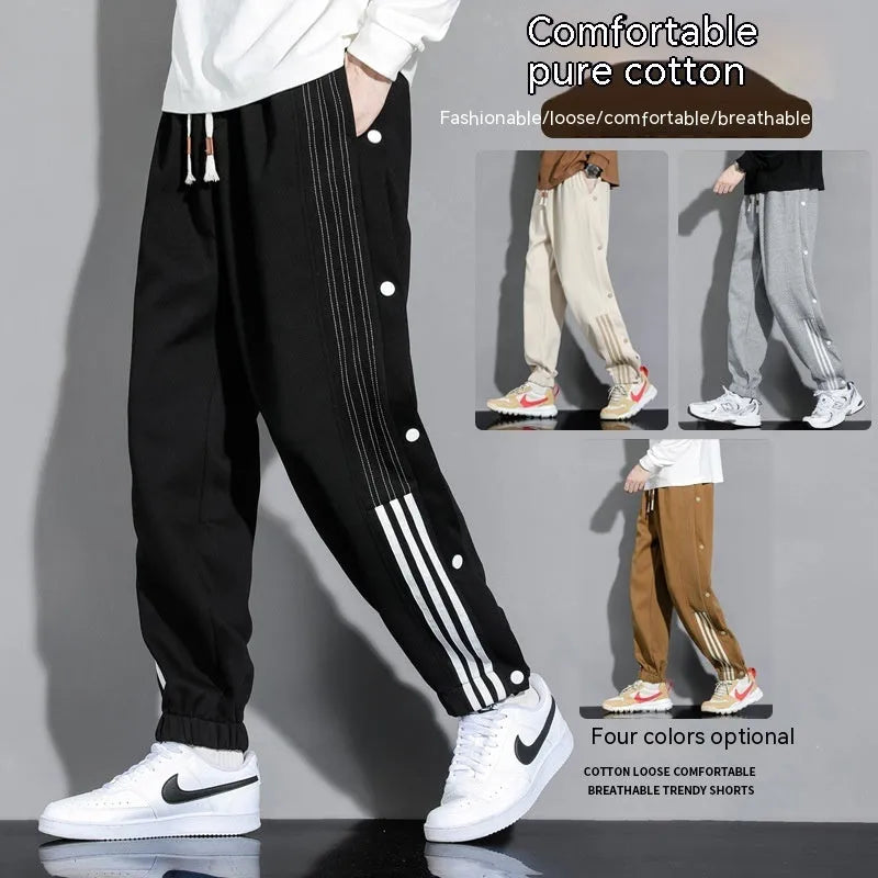 Men's loose fit sweatpants with ankle-tied cuffs in cotton blend fabric