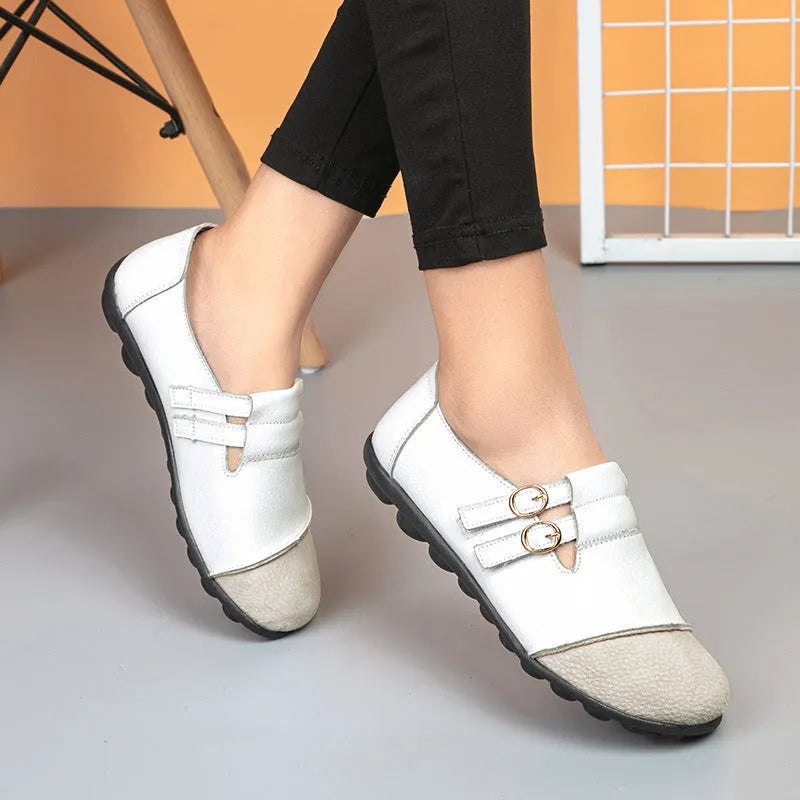 Casual low top flat shoes with Velcro strap in cow split leather, available in multiple colours.