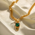 Gold electroplated titanium steel pendant necklace with geometric round pendant and Cuban link chain