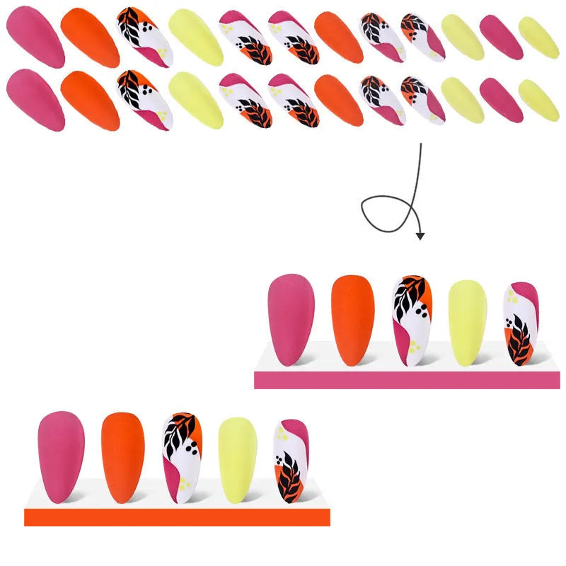Wear Armour medium almond nail stickers showing four decorative designs including French leaves and gradient leopard print patterns