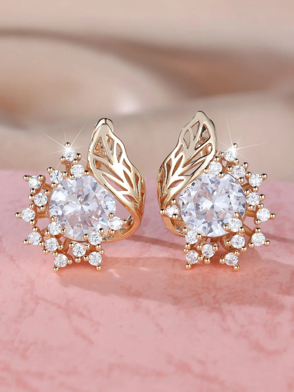 Round flower feather zircon drop earrings with champagne gold electroplate and coloured crystal settings.