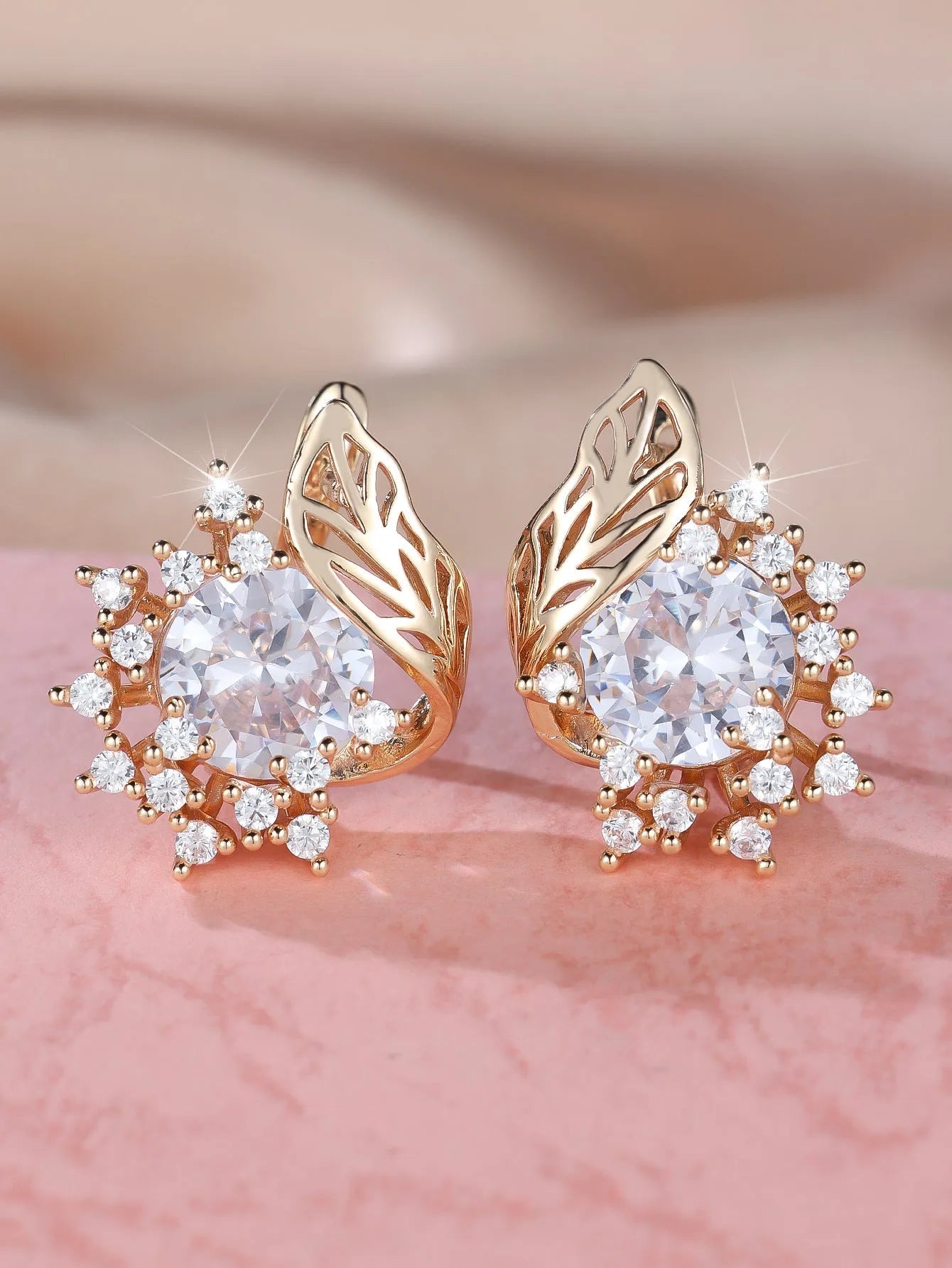 Round flower feather zircon drop earrings with champagne gold electroplate and coloured crystal settings.