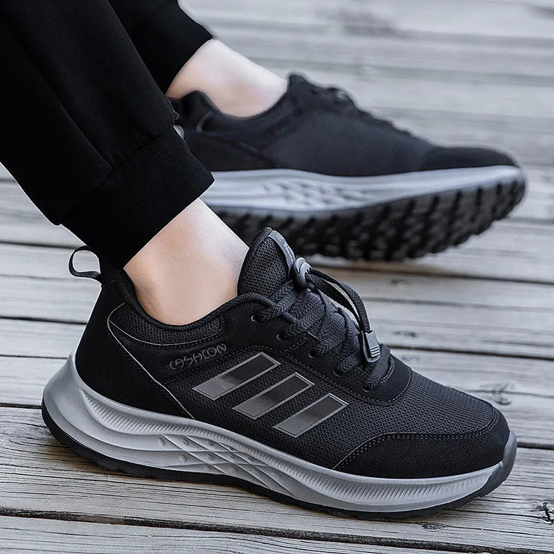 Breathable mesh casual shoes with elastic band closure in black, dark grey, purple and purplish red.