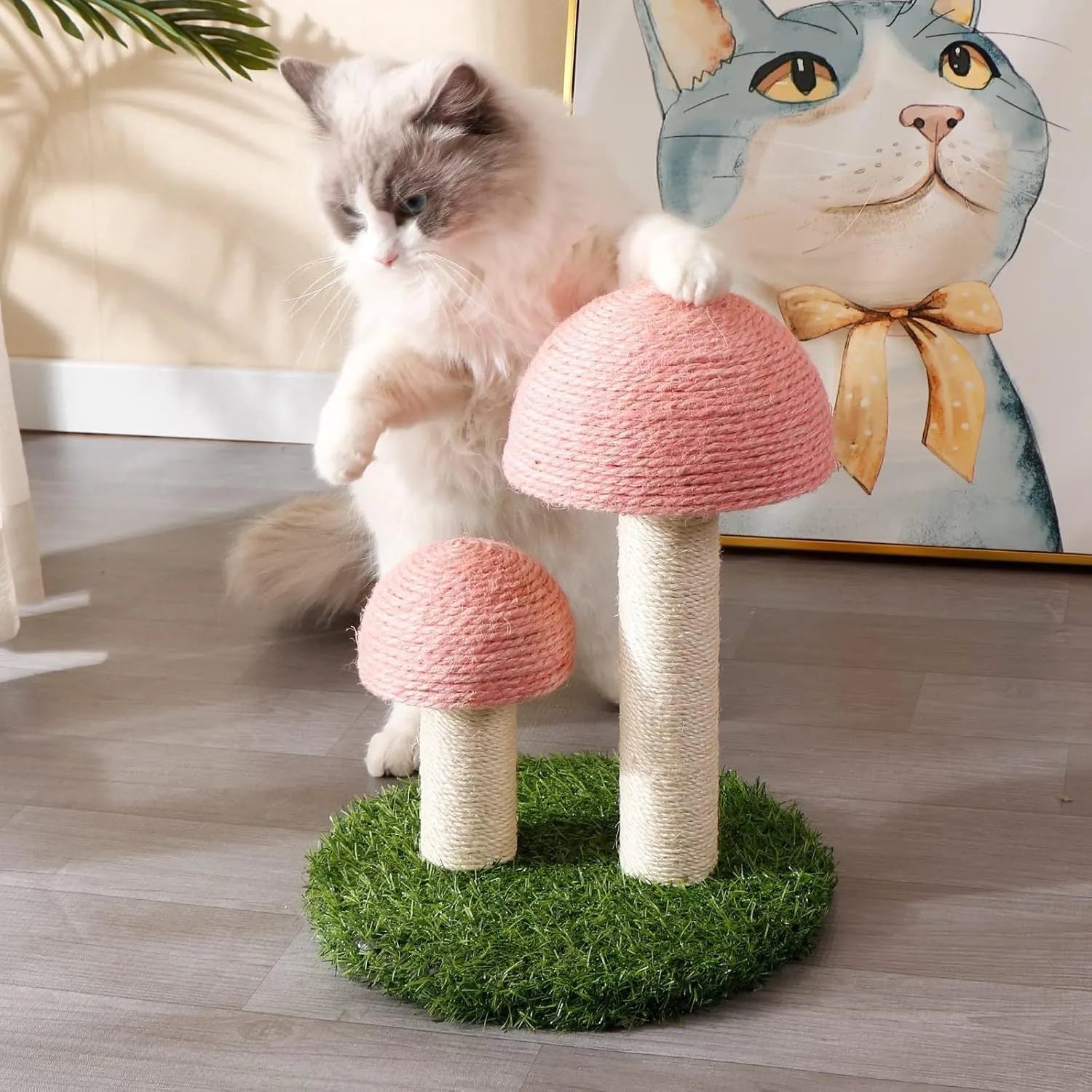 Pink mushroom-shaped cat scratching post with natural sisal covering for small cats
