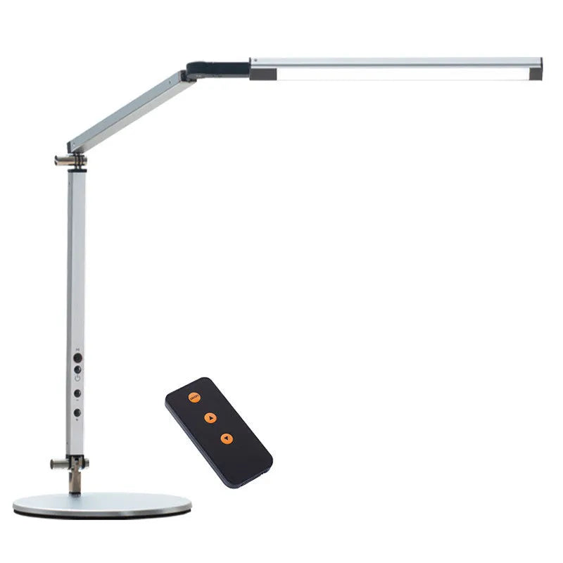 Black clip mount LED desk lamp with dimmer switch attached to study desk edge