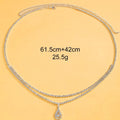 Gold or silver women's waist chain with water drop pendant and rhinestone tassel, showing lobster clasp.