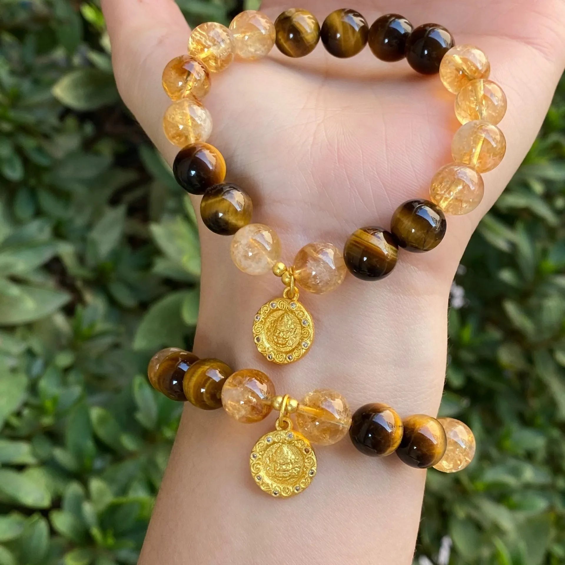 Handmade unisex crystal bracelet with diamond-studded gourd charm and mix of 8mm and 10mm prayer wheel, topaz, and disc beads.