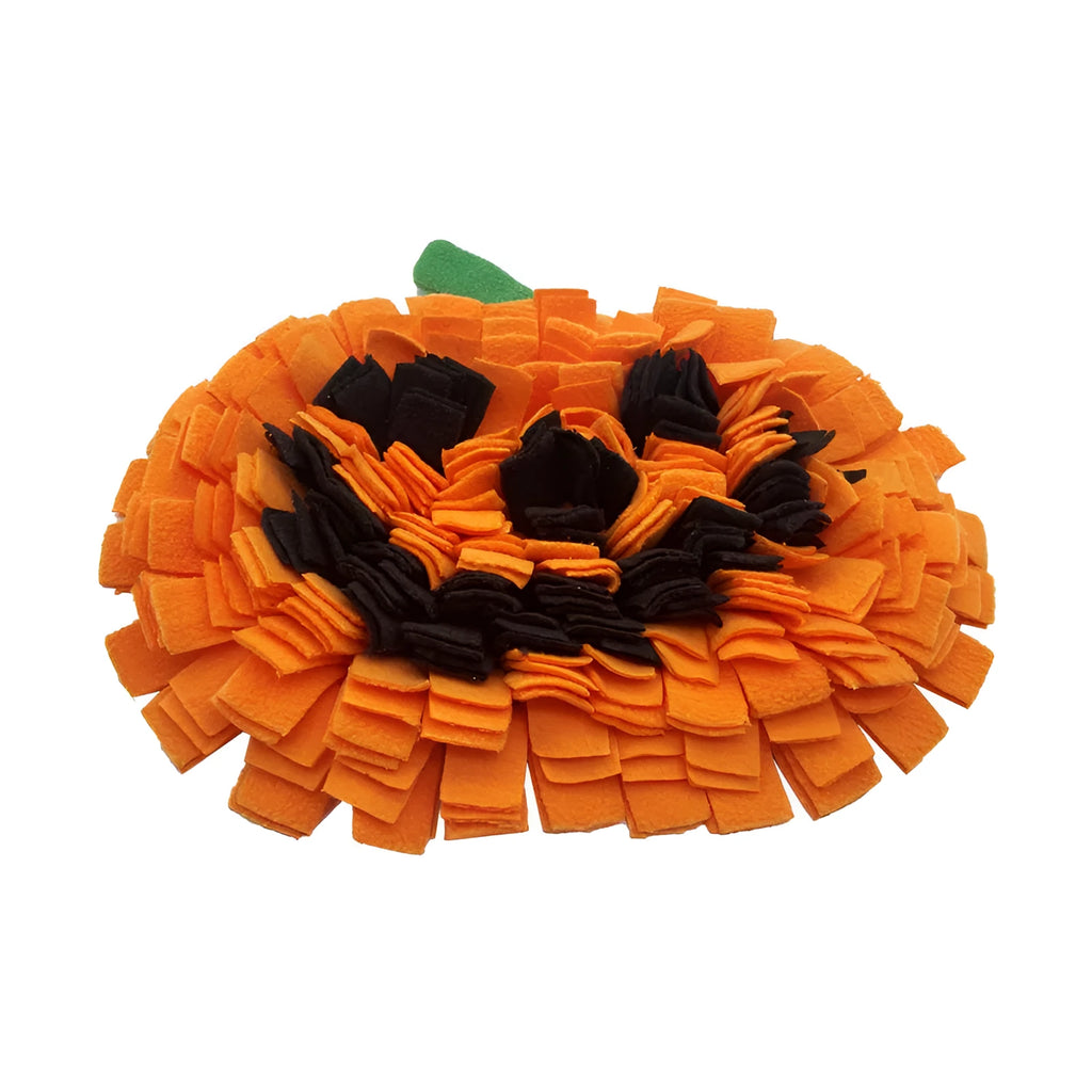 Orange pumpkin-shaped dog sniffing mat with a textured fur-like surface for slow feeding and enrichment.