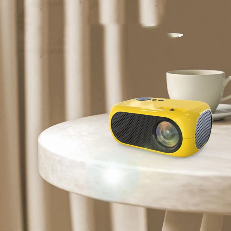 M24 micro mini portable LED projector in gold or white with 640×360p resolution on ABS casing