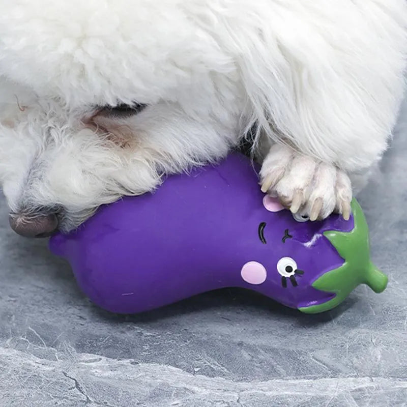 Latex vegetable dog chew toys showing cartoon onion and eggplant designs in green, orange and purple colours