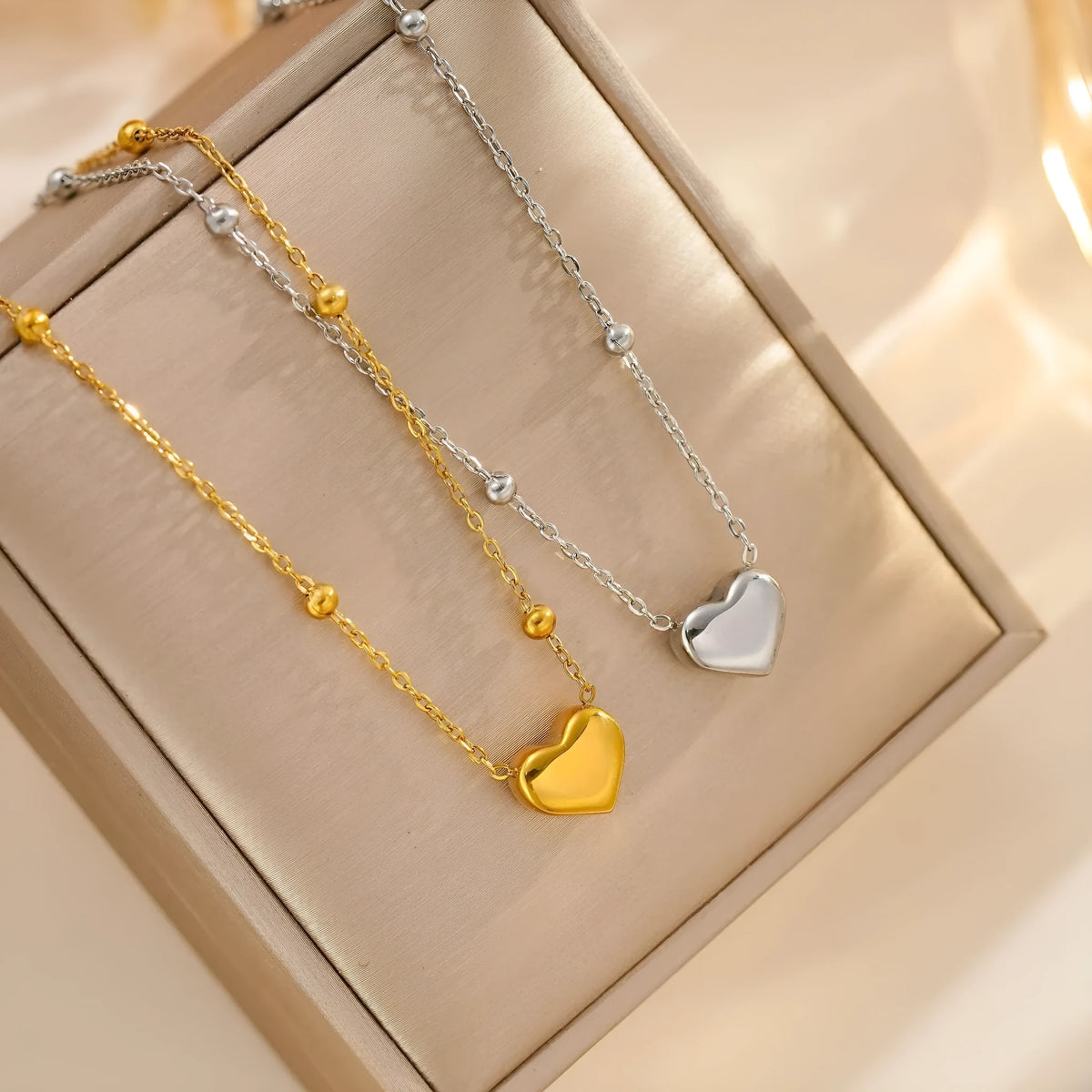 Women's titanium steel love necklace with geometric pendant and ball bead chain in silver