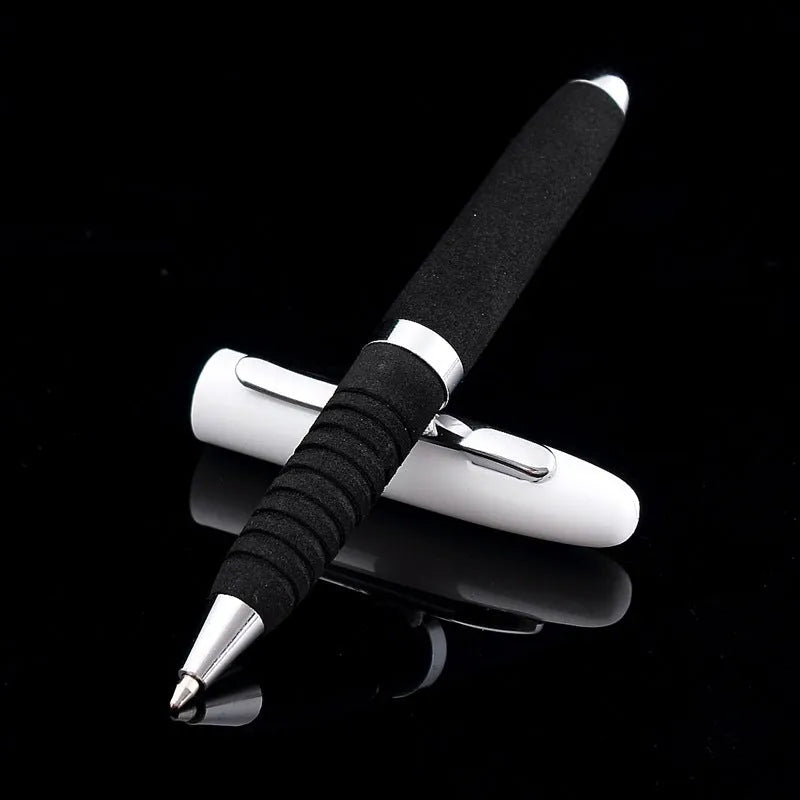 Metal ballpoint pen with bullet tip shown alongside seven refill colour options