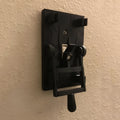 Retro-style decorative wall light switch plate with mechanical switch in PLA material.