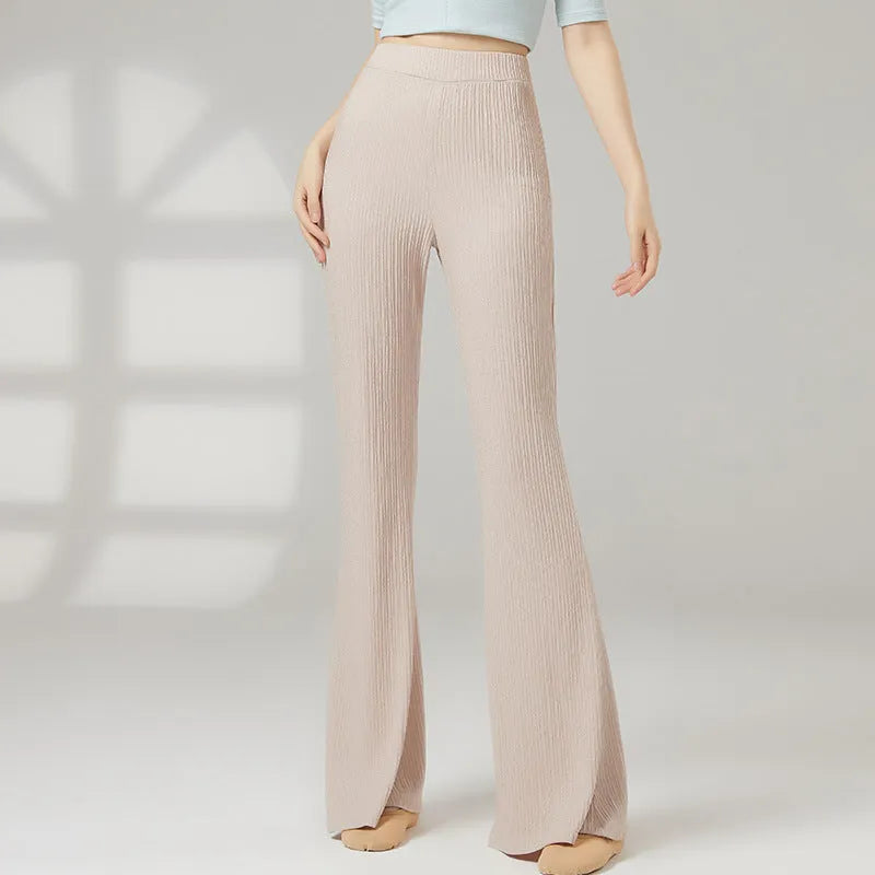 Women's solid colour polyester dance practice pants for classical and sports dance training.