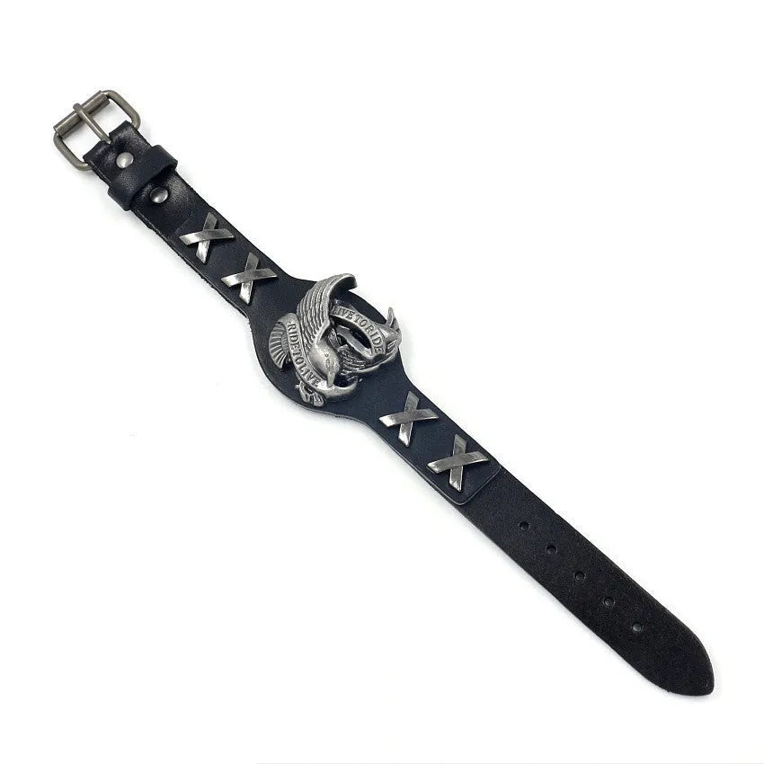 Black geometric bracelet with eagle watch-button closure on leather strap showing adjustable width design