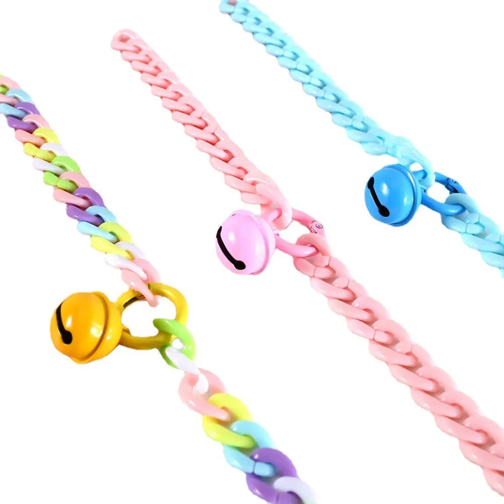 Macaron candy colour plastic pet collar on white background showing chain blue, pink and mixed colour options