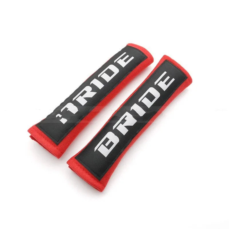 Pair of cotton car safety belt shoulder pads in black blue and red with embroidery