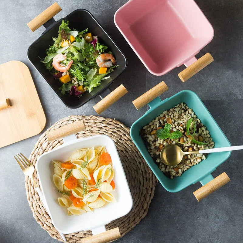 Porcelain ceramic bowl with irregular shape and matching lid in modern simple design