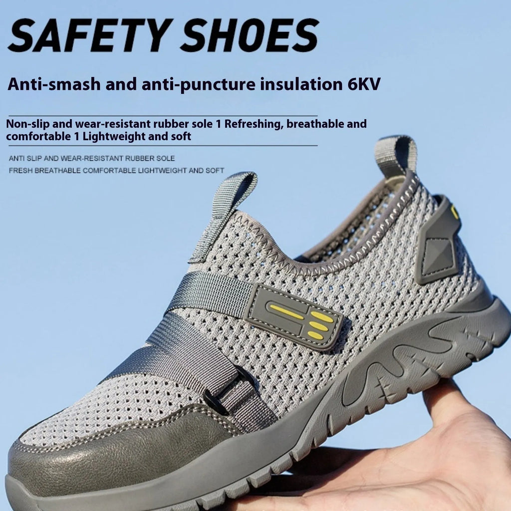 Men's grey anti-smash and anti-puncture safety shoes with a flying woven upper and rubber sole.
