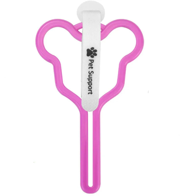 A hands-free dog poop bag holder with a fixed clip and adjustable black Velcro strap, shown attached to a dog lead.