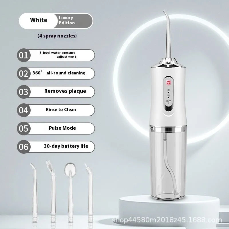 Pink electric water flosser with nozzle and water tank on a bathroom surface