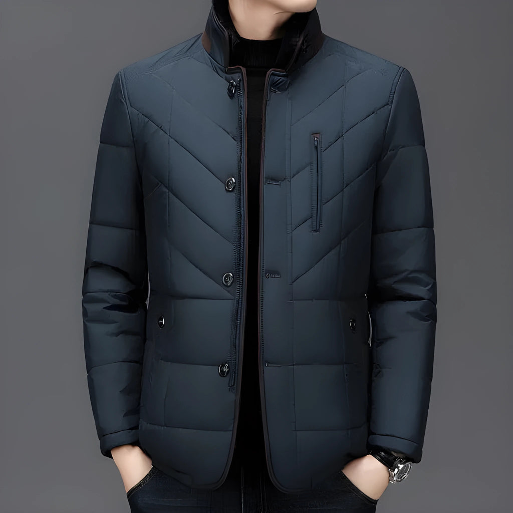 Men's dark blue winter short padded coat with side pockets on a solid background.