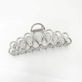 Gold or silver large alloy hair clip with tassel detail for women's updos